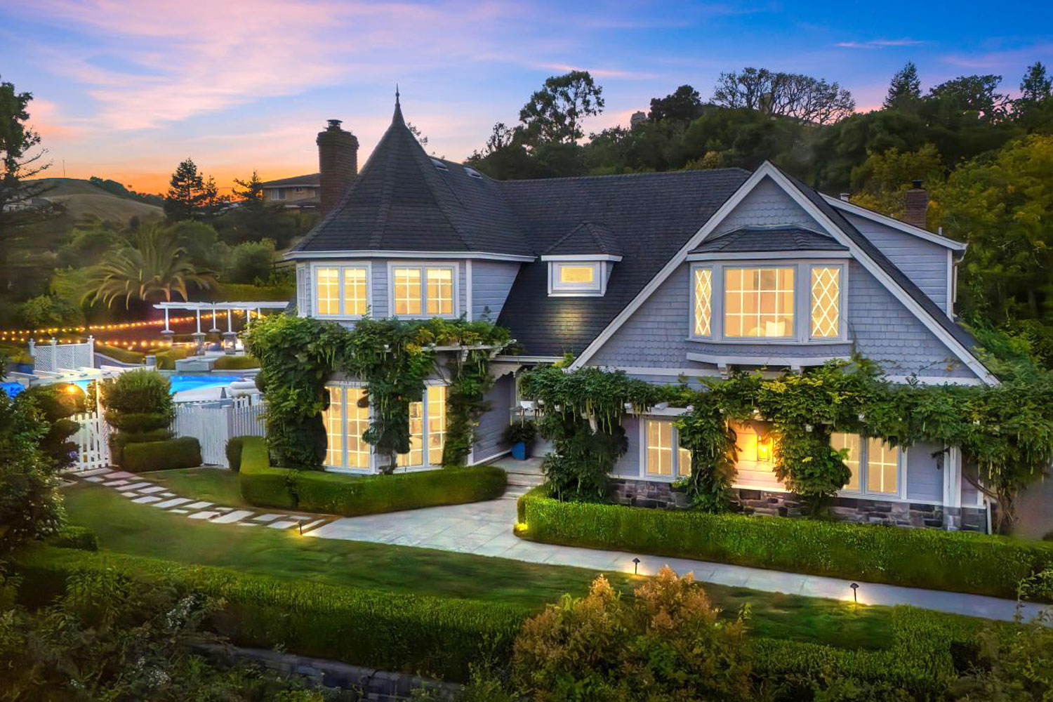 Exterior image. Estate home, vineyard, and swimming pool.